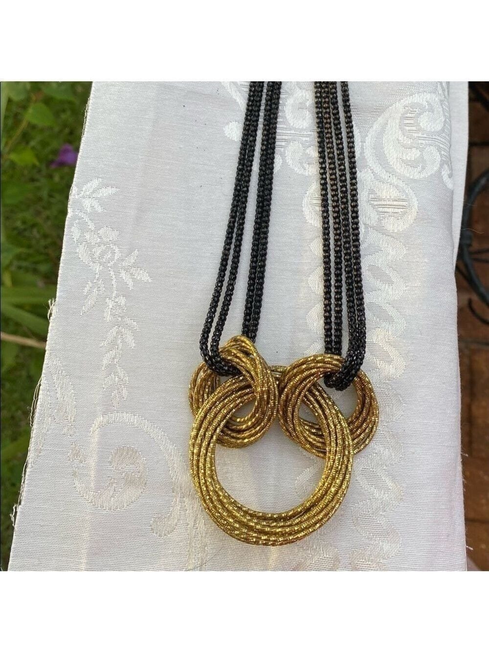 Gold tone and Black Costume Jewelry Multiple Entwined rings Choker Necklace